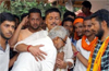 Winners visit families of slain party workers, dedicate victory